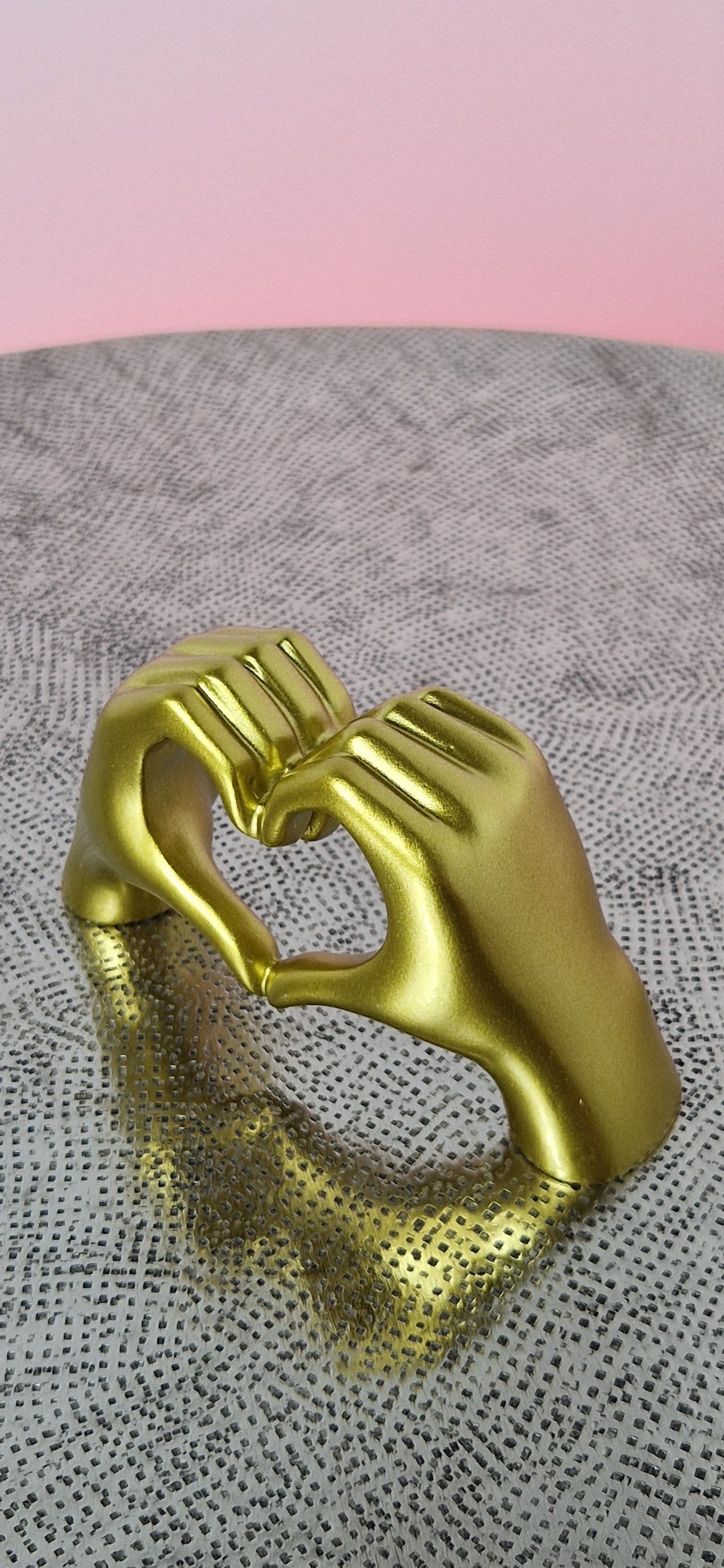 Sculpture "Mains en Cœur"